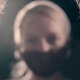 Offred, sporting a red gag, readies herself for the hangman’s noose in a season two trailer.